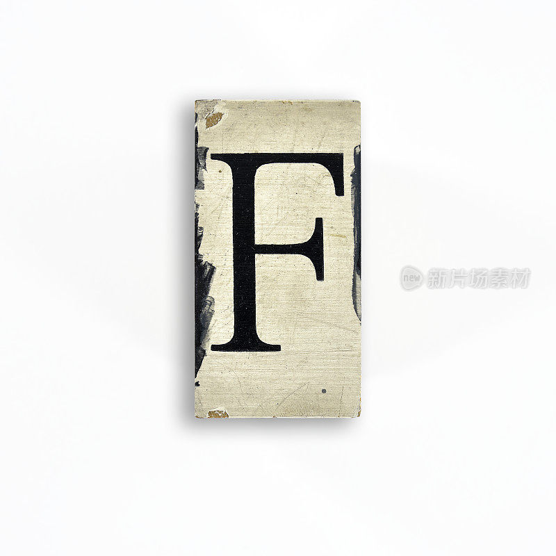 木制衬线的大写字母，在白色背景上涂上颜料，字母- F